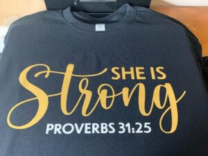 Women “She Is Strong” T-Shirt